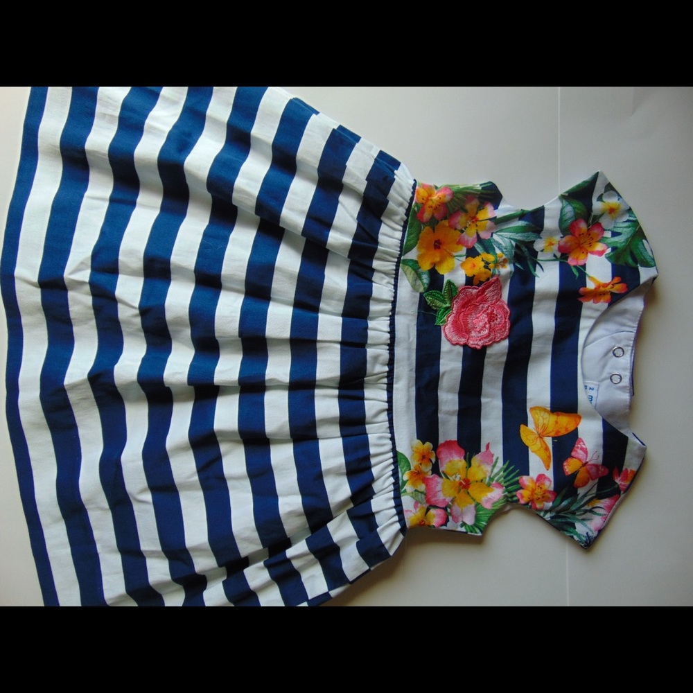 Blue and white striped dress with flowers decor